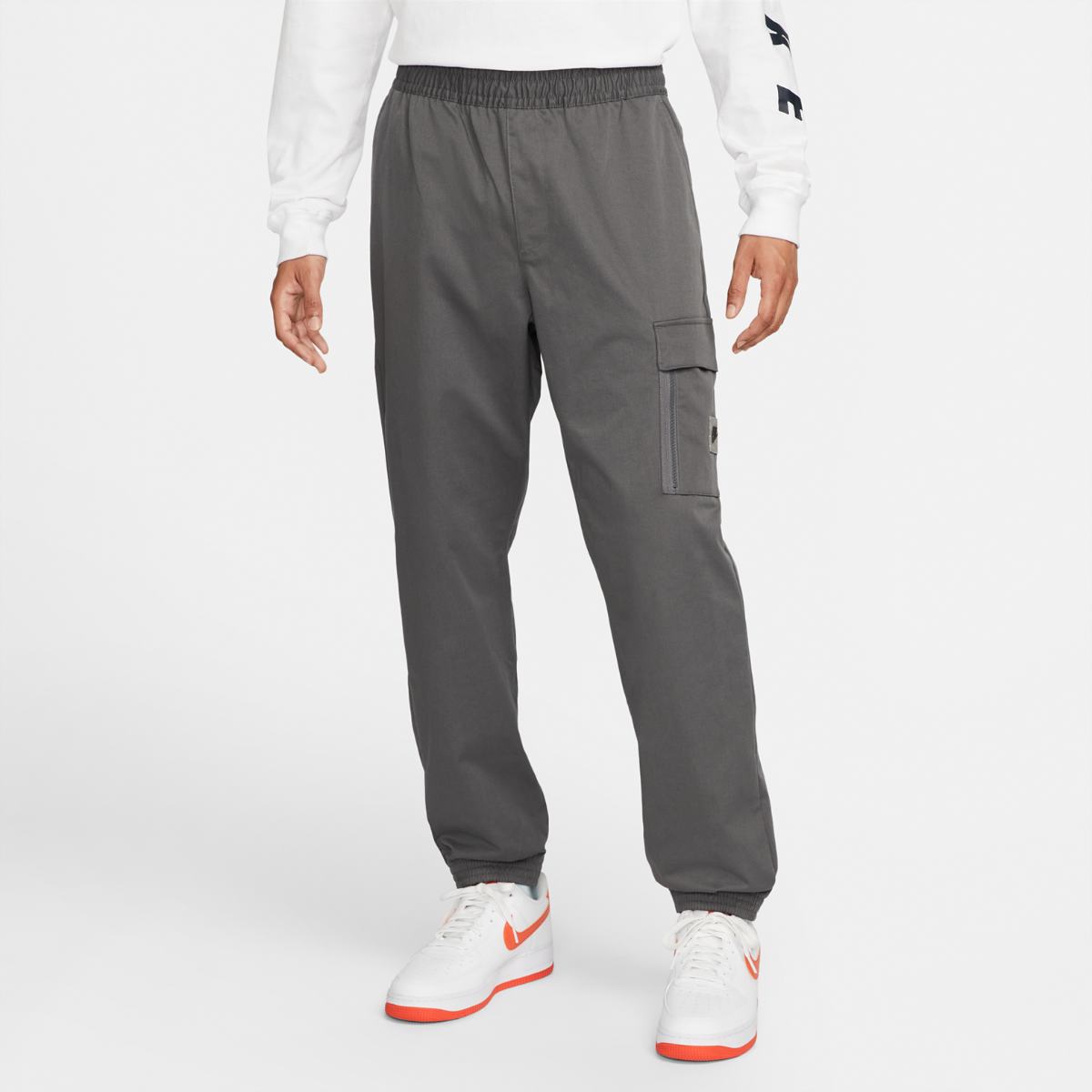 ШТАНЫ NIKE M NSW SPU WVN PANT (DV1127-068)