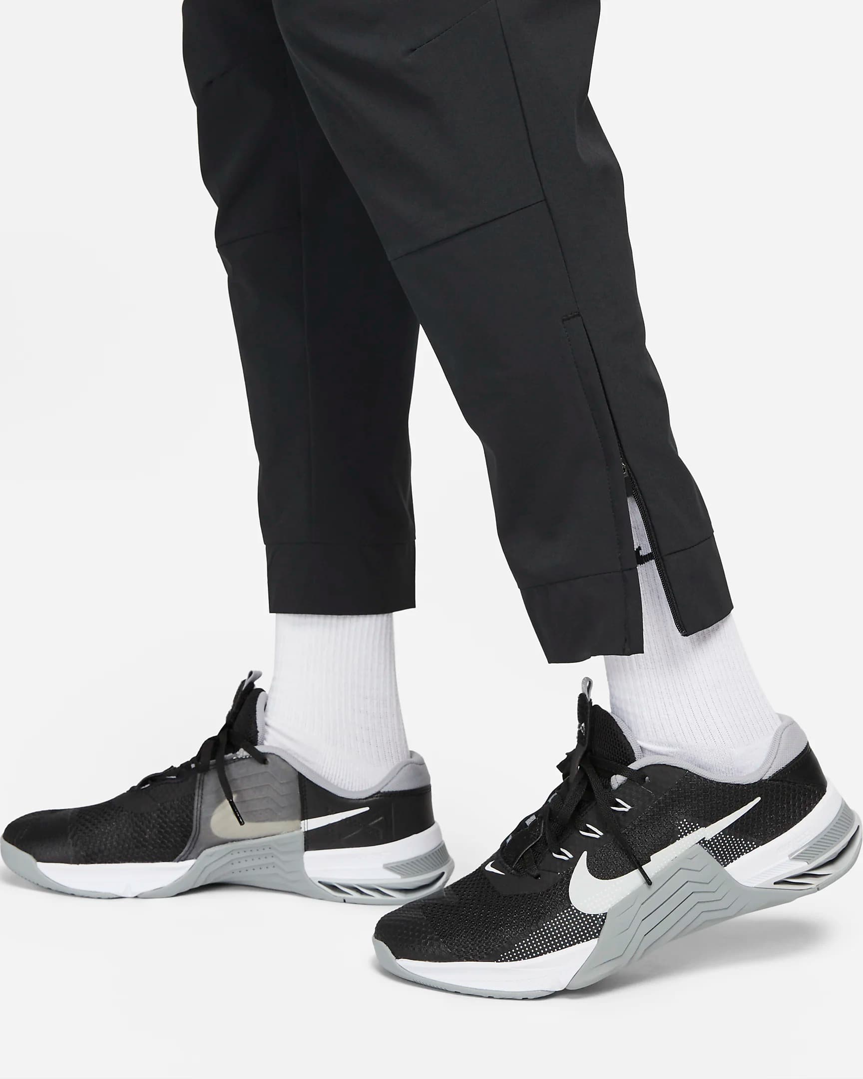 ШТАНЫ NIKE M NK DF UNLIMITED PANT TPR (FB7548-010)