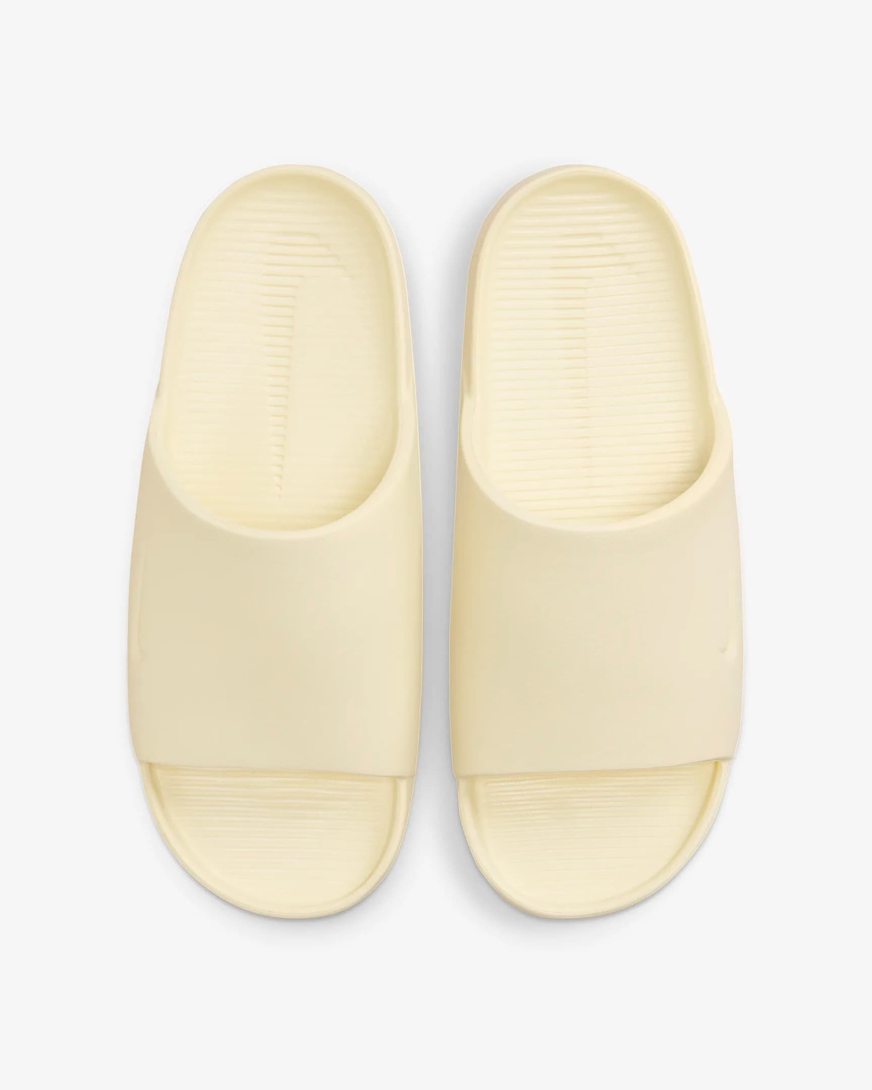 ШЛЬОПАНЦІ WMNS NIKE CALM SLIDE (DX4816-701)