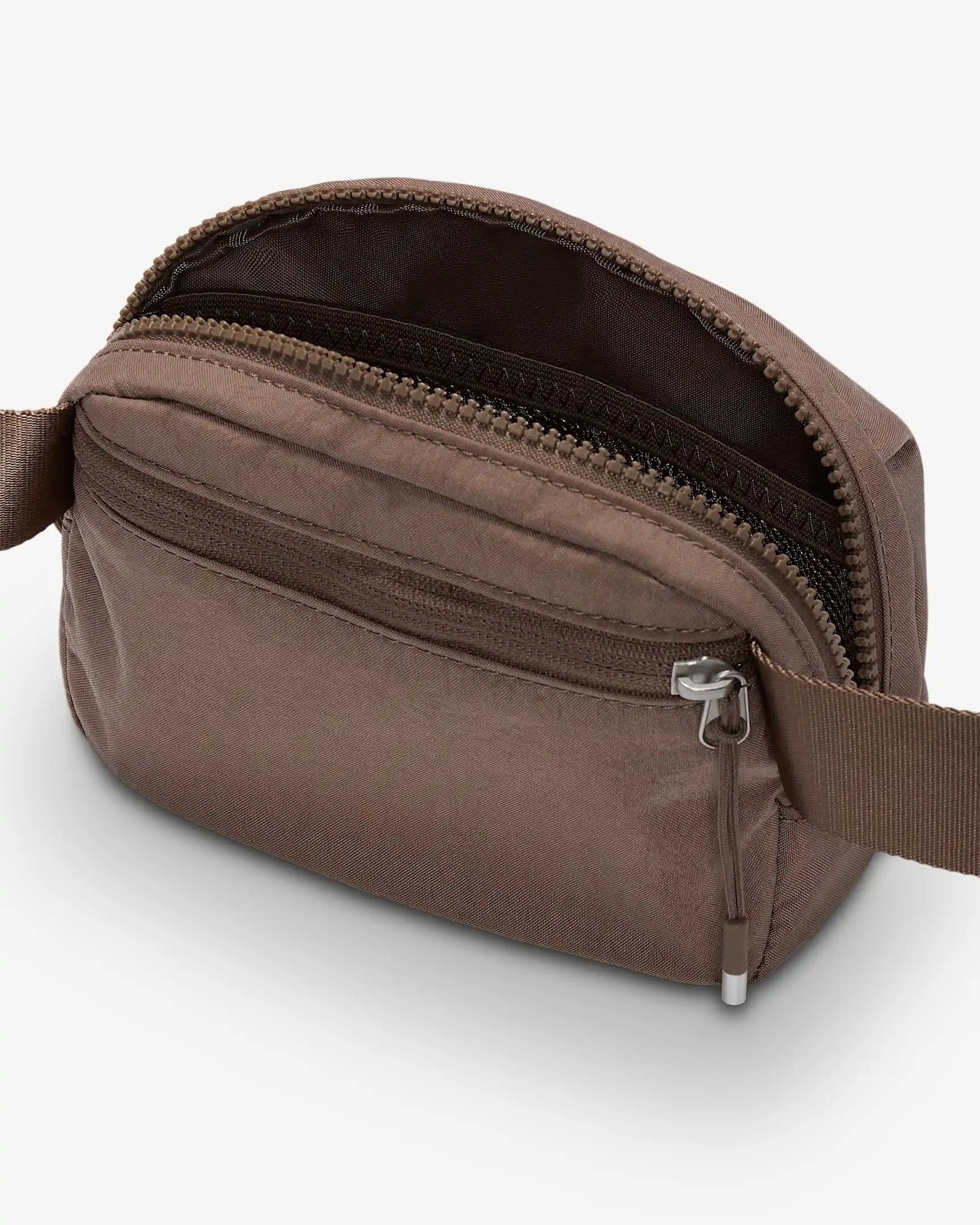 СУМКА УНИСЕКС ЧЕРЕЗ ПЛЕЧО NIKE AURA WAISTPACK (HM6120-214)